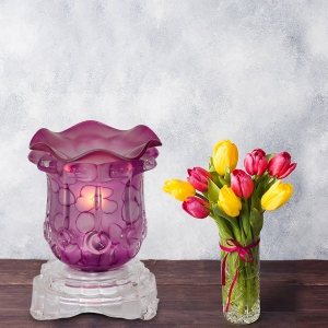 Purple Tulip Light Dimming Oil Warmer Next to Flowers