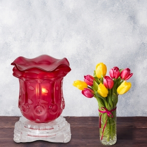 Red Tulip Light Dimming Oil Warmer Next to Flowers