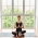 Plumeria Fragrance Oil Being Burned While Woman Meditates